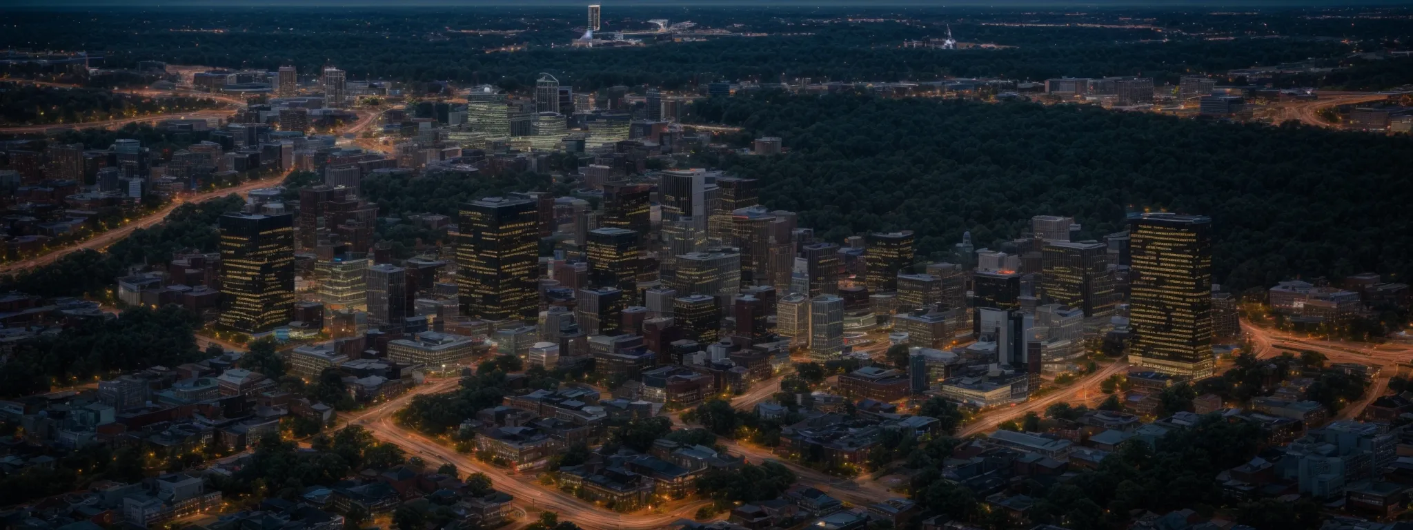 an aerial view of the raleigh skyline at dusk highlights the bustling economic hub.