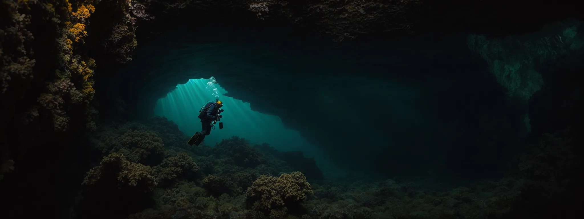 a diver equipped with a flashlight explores a vast, underwater cave system, symbolizing the deep exploration of keyword research methods.