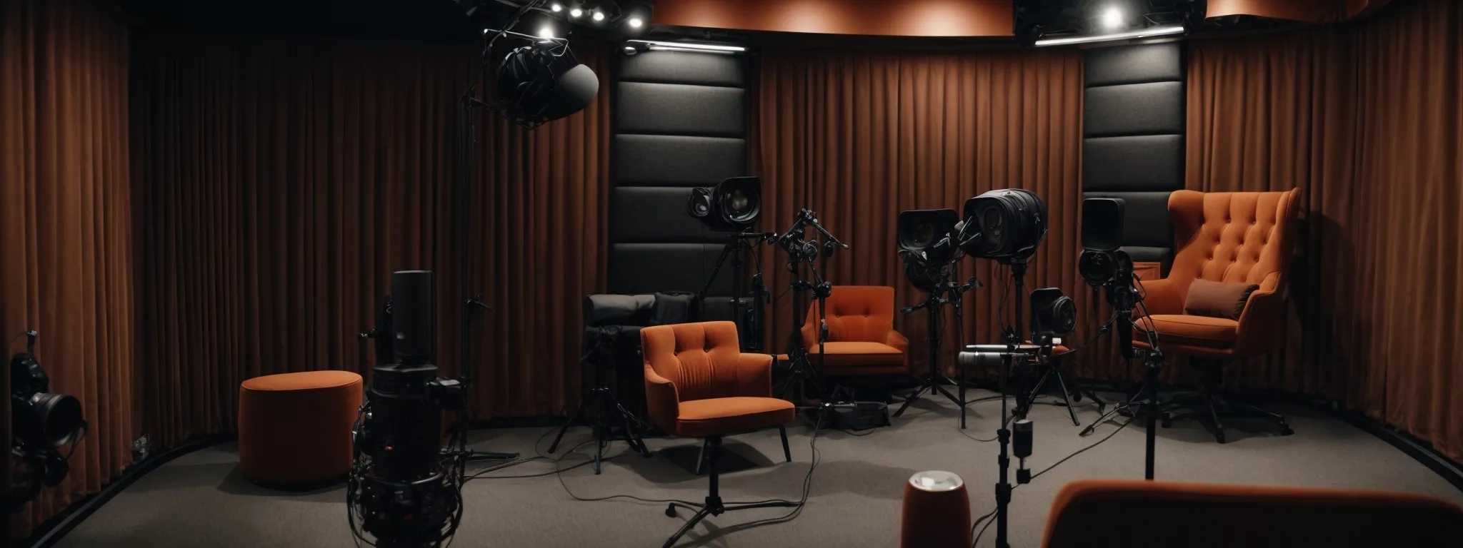a podcast studio with an unoccupied chair and a microphone set amidst soundproofing panels, indicating a space for sharing professional stories and insights.