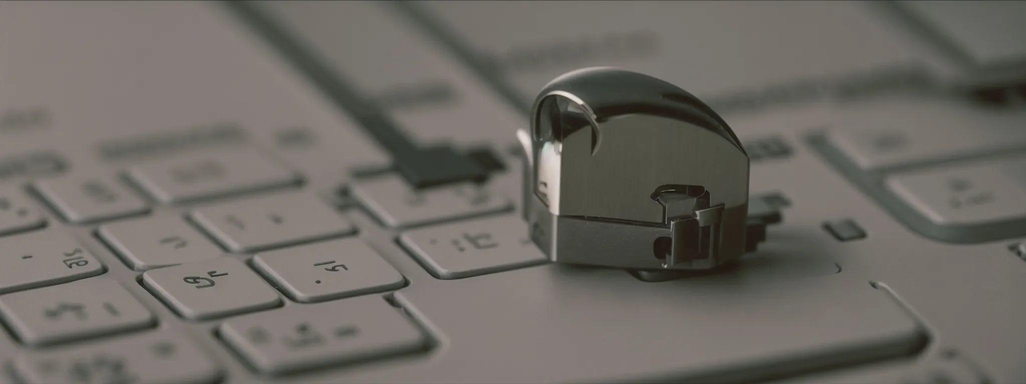 a padlock on a computer keyboard, symbolizing online transaction security.