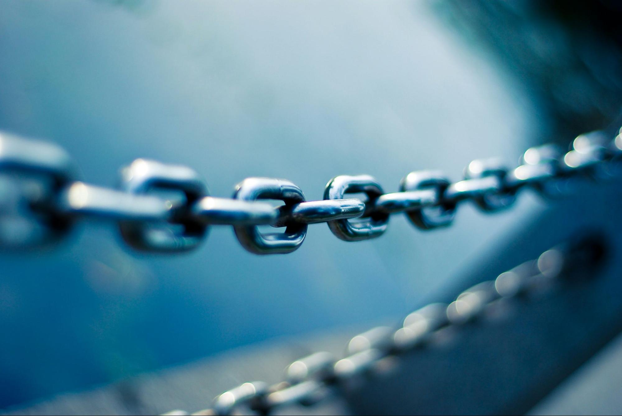 Close-up of a metallic chain symbolizing outbound link SEO, representing how outbound links connect websites and enhance SEO strategies for credibility.