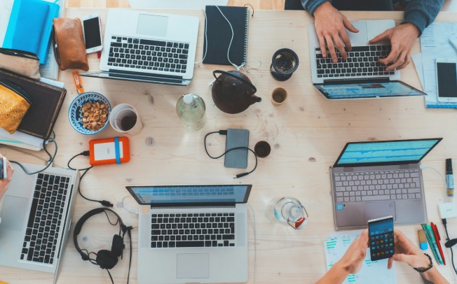 An agency team discusses numbers after learning about SEO terminology